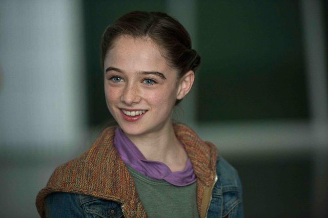 ATHENA. The mysterious figure is played by Raffey Cassidy. Photo courtesy of Disney 