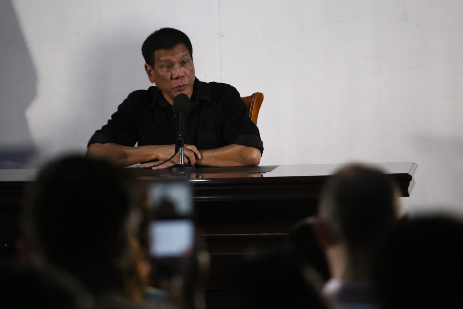 Duterte cries freedom of expression after whistling at female reporter