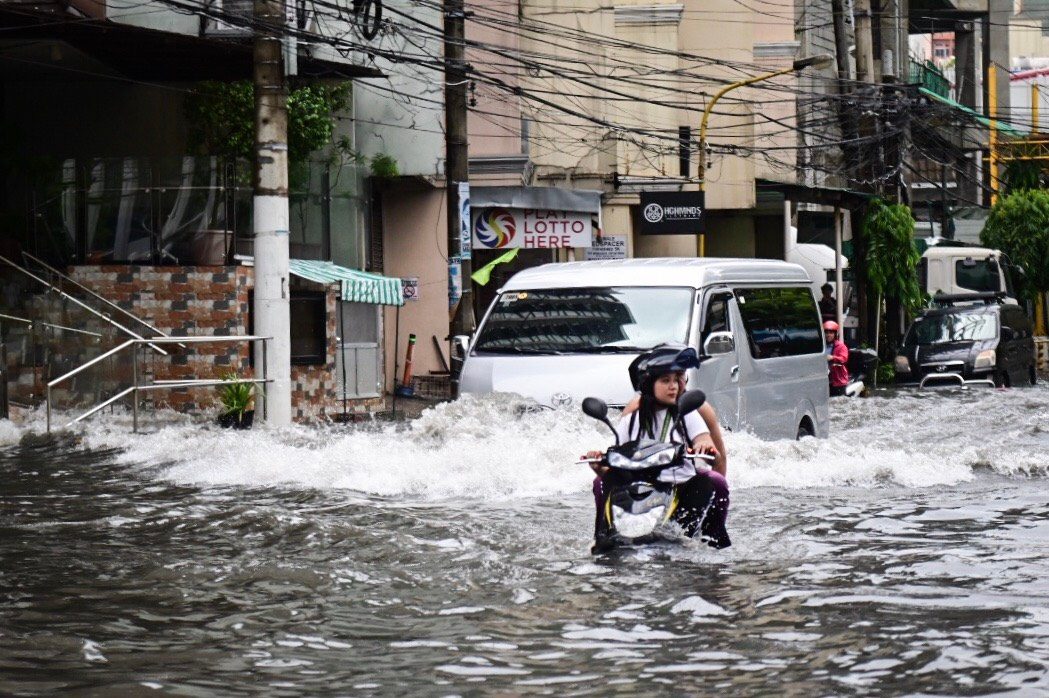 IN PHOTOS: Floods hit Ilocos Norte, Metro Manila due to Ineng, monsoon