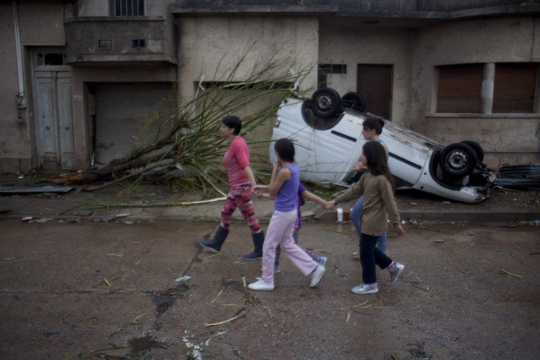 South American floods kill 12, force mass evacuations