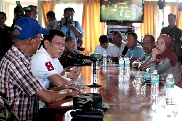 PRESIDENT IN BASILAN. President Rodrigo Duterte holds a meeting with local officials at the 104th Brigade Camp in Isabela City, Basilan on July 21. Photo by Robinson Ninal/PPD  