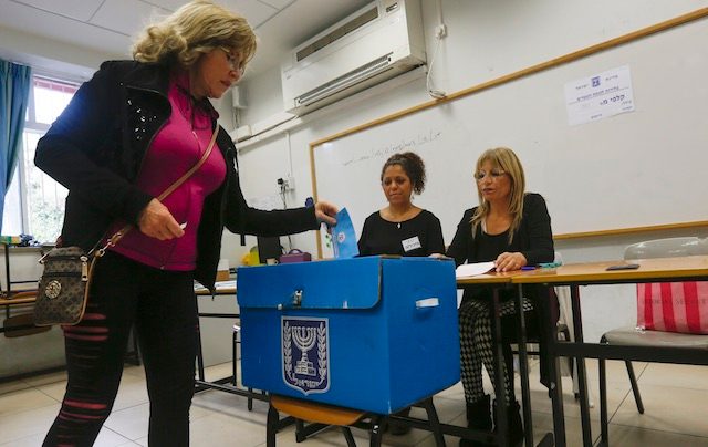 Israelis vote in tight race