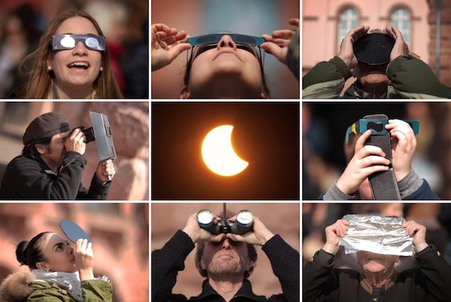 EYES ON THE SUN. A composite picture of people watching the partial solar eclipse from Gutenbergplatz square in Mainz, Germany, March 20, 2015. Frederik Von Erichsen/EPA 
