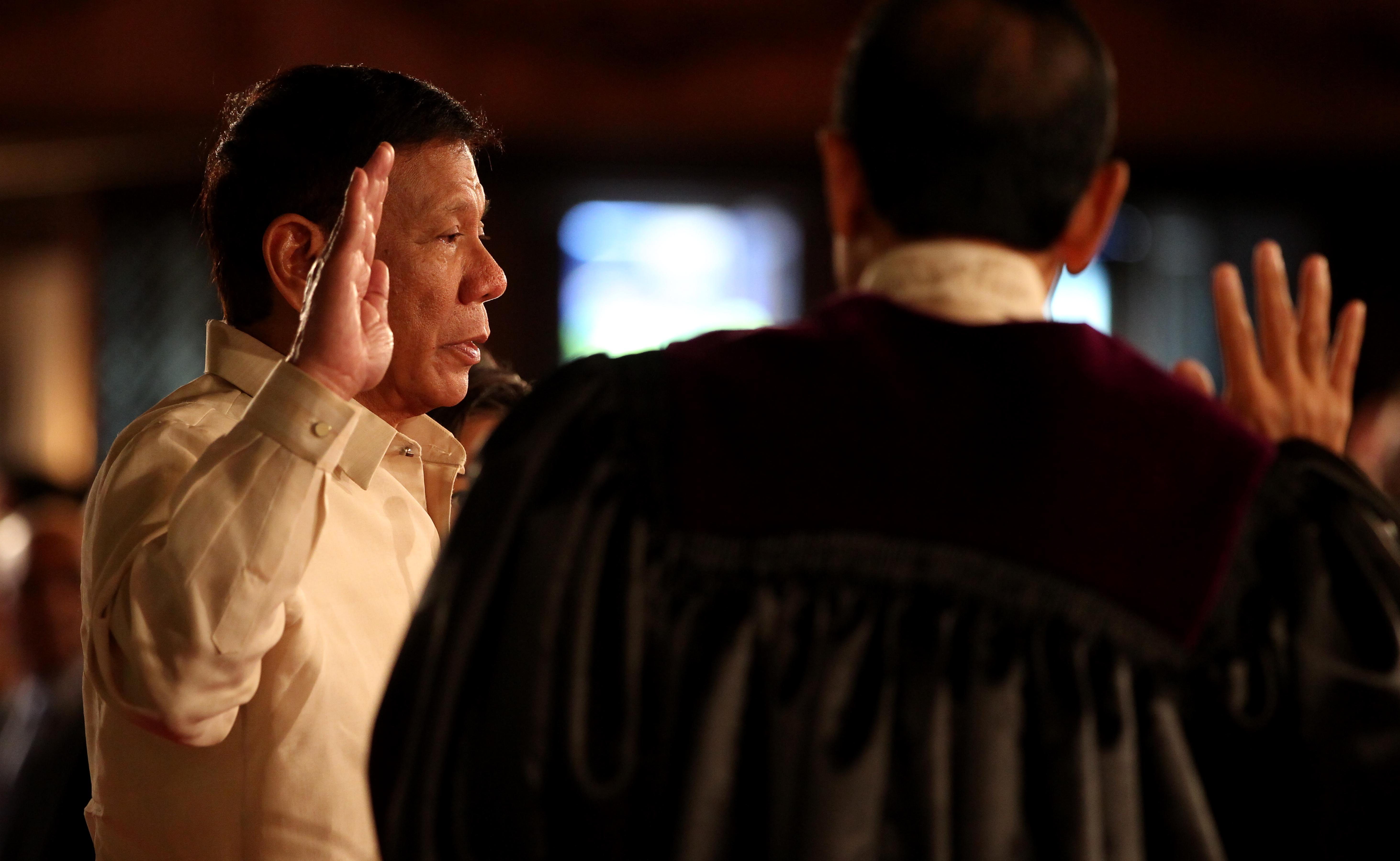 OATH TAKING. President-elect Rodrigo Roa Duterte takes his oath of office as the 16th President of the Republic of the Philippines. Photo from Malacanang 