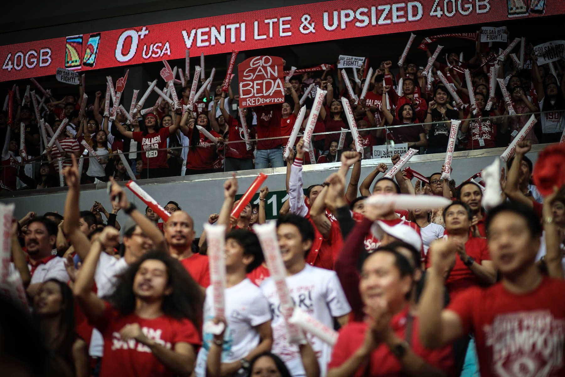 REDEMPTION. San Beda fans cheer their team on as they redeem themselves from a championship loss last season. Photo by Josh Albelda/Rappler 