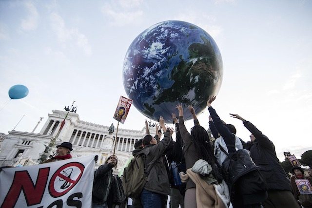HANDS UP. People rally to promote climate protection in Rome, Italy, 29 November 2015. The 21st Conference of the Parties (COP21) is held in Paris from 30 November to 11 December. The aim is to reach an international agreement to limit greenhouse gas emissions and curtail climate change. EPA/MASSIMO PERCOSSI  