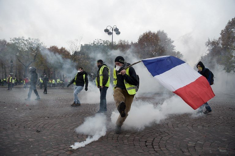 Paris police fire tear gas, water cannon against ‘yellow vest’ protesters