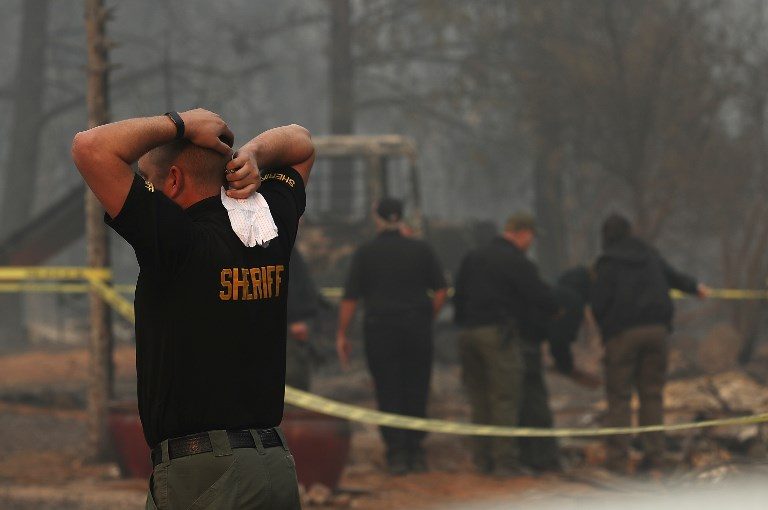 Investigators in grim search for dead as California fires rage