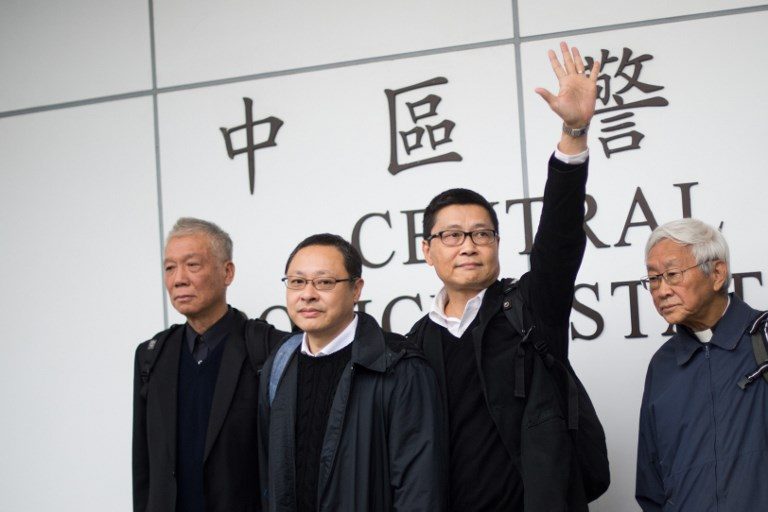 Pioneering democracy trio prepare for trial in Hong Kong