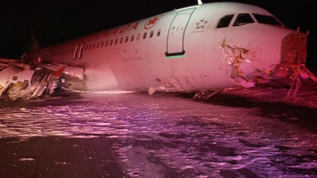 BELLY LANDING. Handout image released by the Transportation Safety Board of Canada showing an Air Canada Airbus A320 which slid off the runway following a hard landing in poor weather conditions in Halifax, Nova Scotia, Canada, 29 March 2015. Transportation Safety Board of Canada/Handout/EPA 
