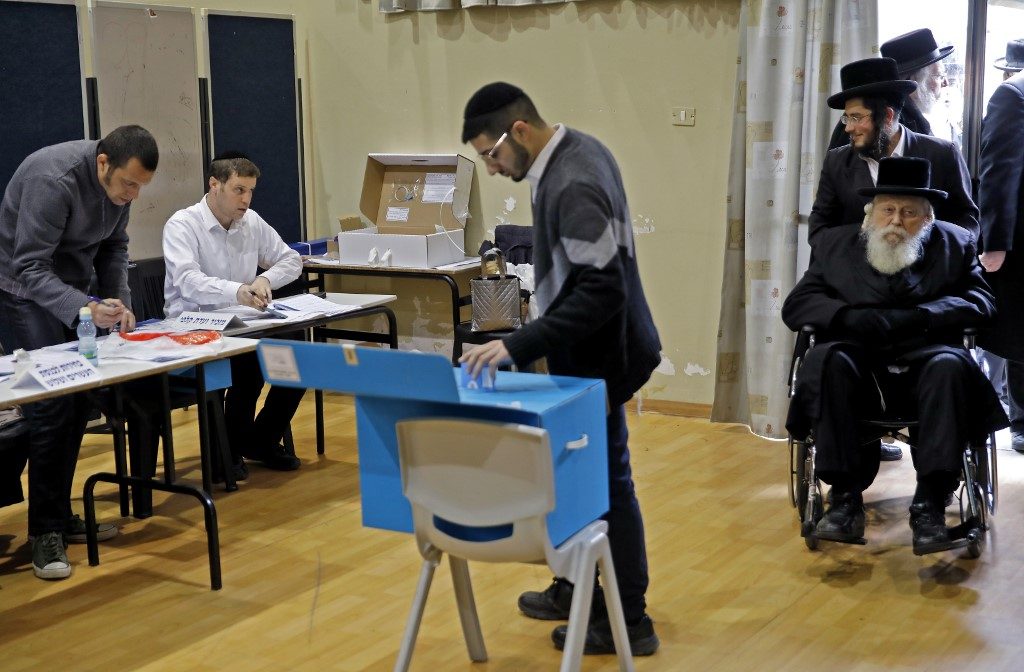 Israel seeks end to deadlock with third election in a year