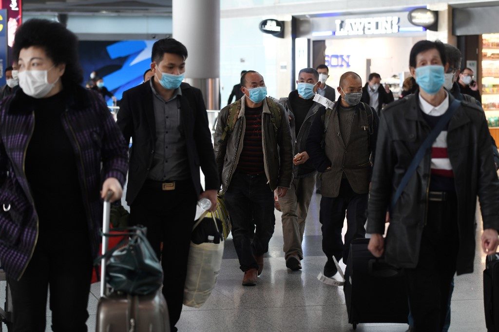 Beijing orders quarantine for all international arrivals