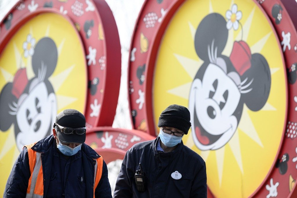China signals progress in coronavirus battle as Disney partially reopens