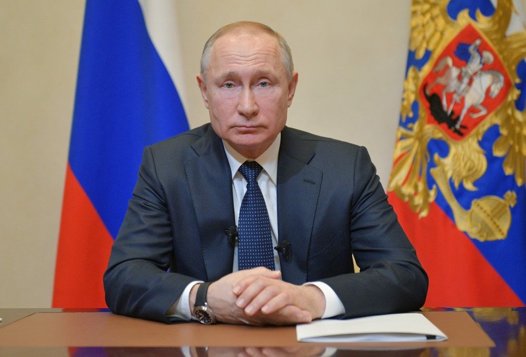 Putin urges Russians to vote for security, prosperity