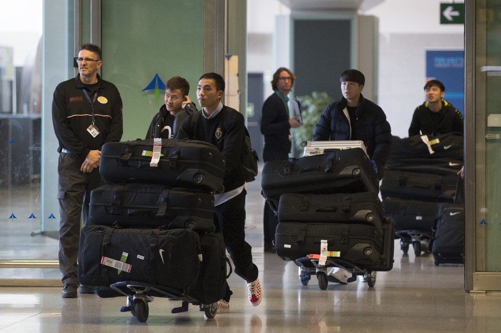 Wuhan football club back in China after being stranded in Spain