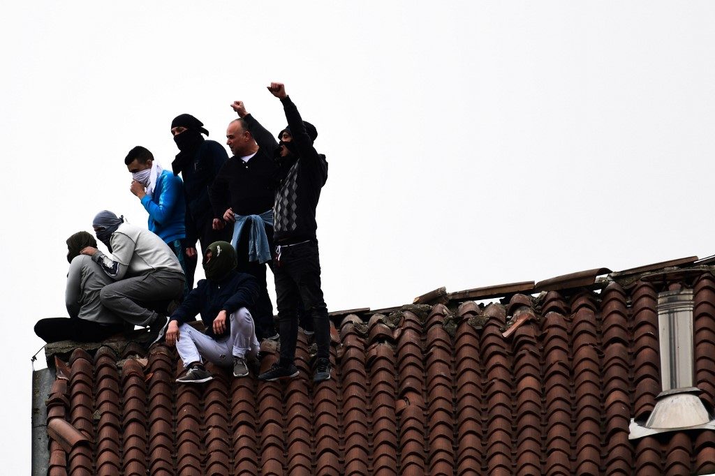 Italy prison riots over coronavirus leave 12 dead