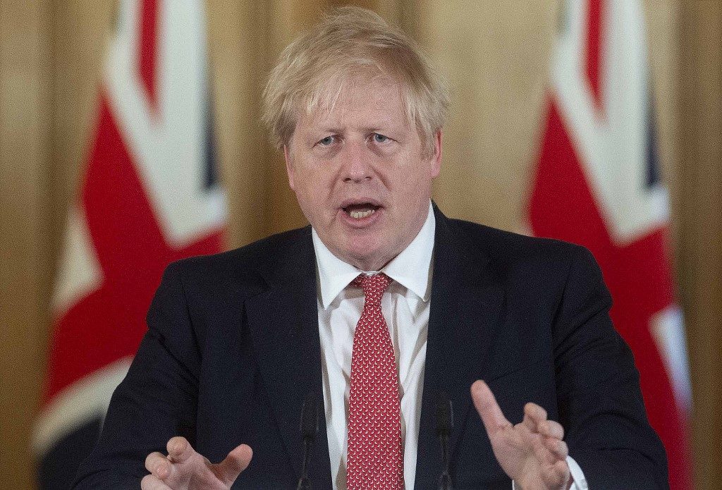 JOHNSON. Britain's Prime Minister Boris Johnson gives updates on the government's response to the COVID-19 outbreak in London, United Kingdom on March 20, 2020. File photo by Julian Simmonds/AFP 