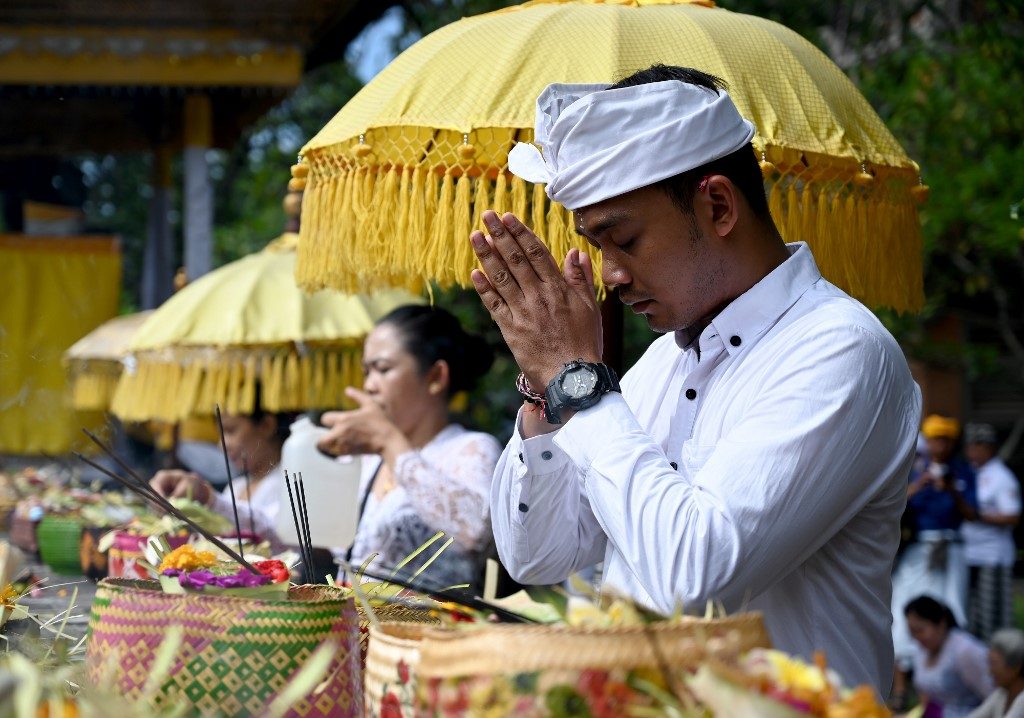 Bali prays as virus hits tourism on Island of the Gods