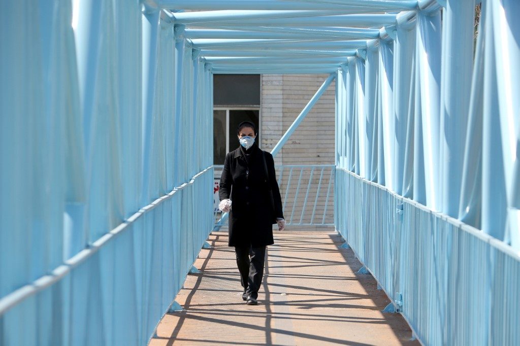 Iran reopens parliament as virus infections drop for seventh day