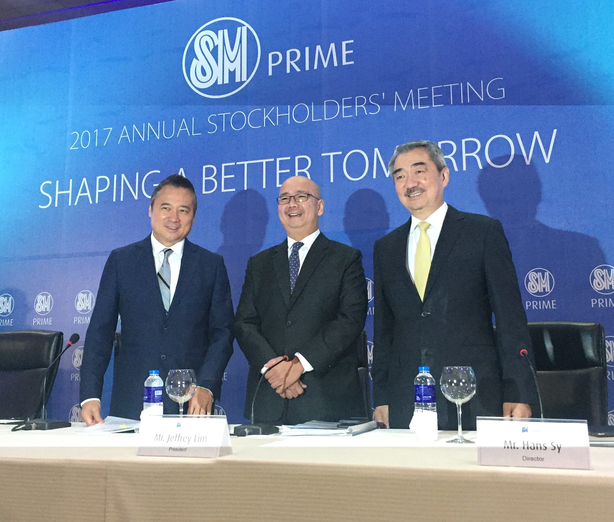 BUILD, BUILD. SM Prime President Jeffrey Lim (middle) says company plans to spend at least P100 billion over the next two years to support its developmental goals here and abroad. Photo by Chrisee Dela Paz/Rappler 