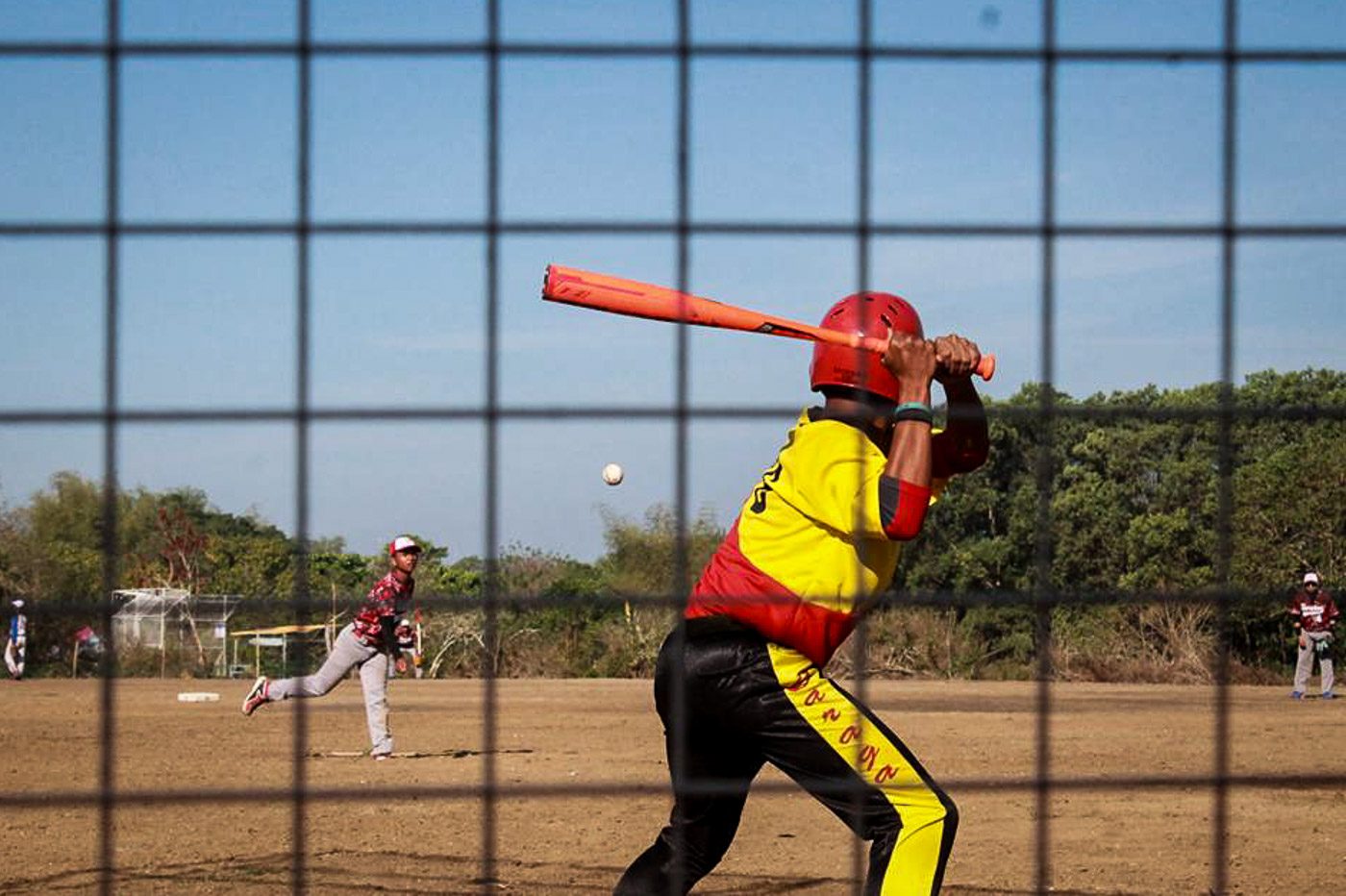 DETERMINATION. A batter from Team CARAGA tries to hit the ball during the first inning of the Boys Baseball, secondary level match. Region IV-A won the game. Photo by Ed Ryan/ Rappler 