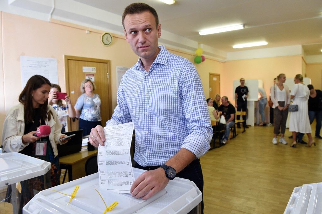 Russia targets opposition leader Navalny with mass raids