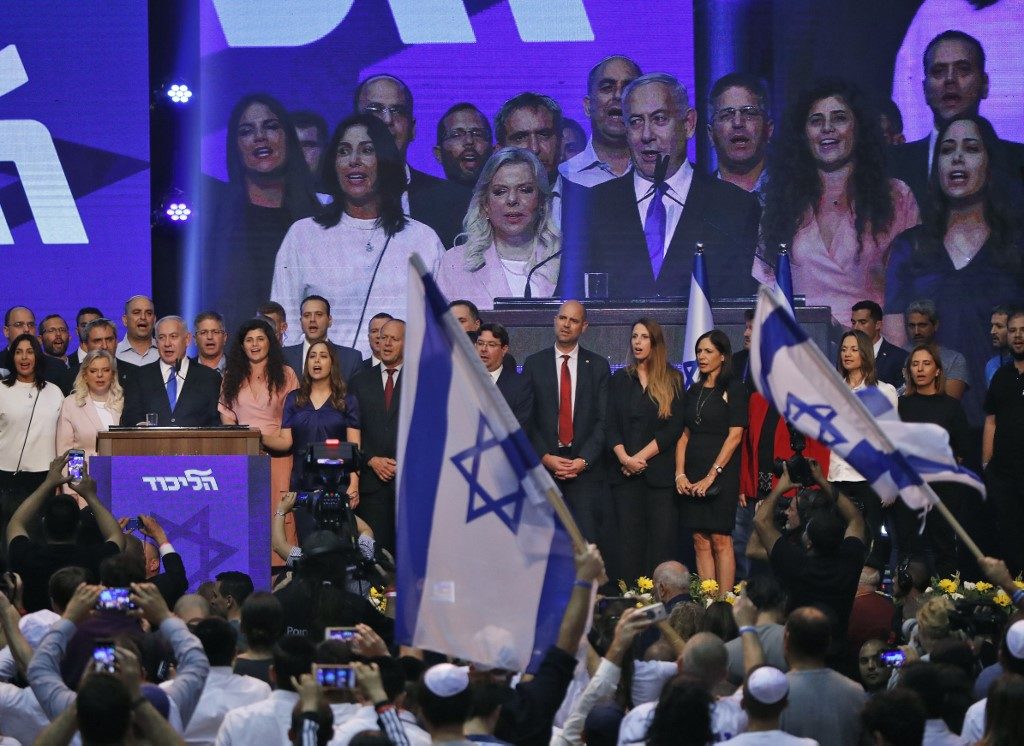 Netanyahu, Gantz supporters in waiting game as poll results trickle in