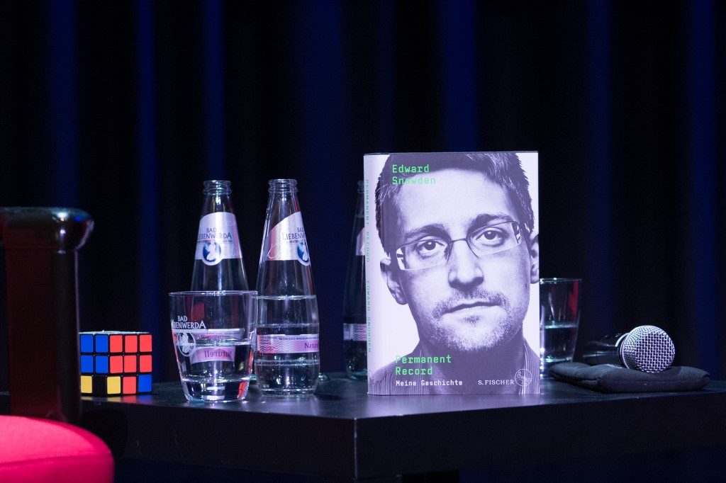 U.S. Justice Department sues Snowden over new book
