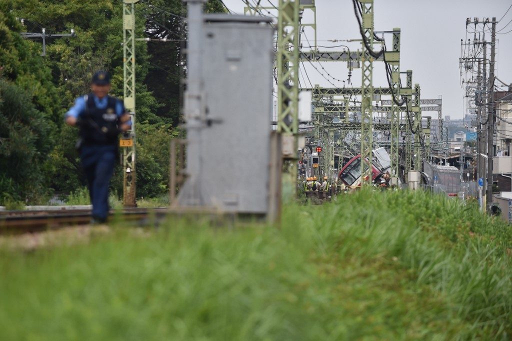 1 dead, 30 hurt as train, truck collide near Tokyo