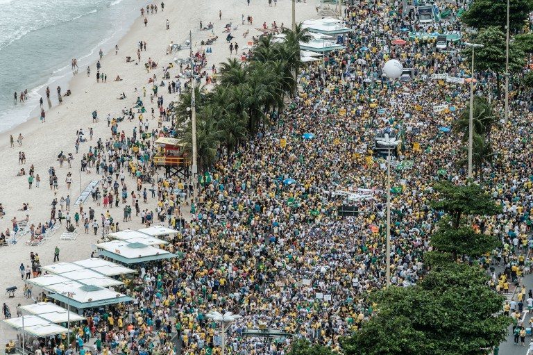 Brazilians protest corruption, target president’s ally