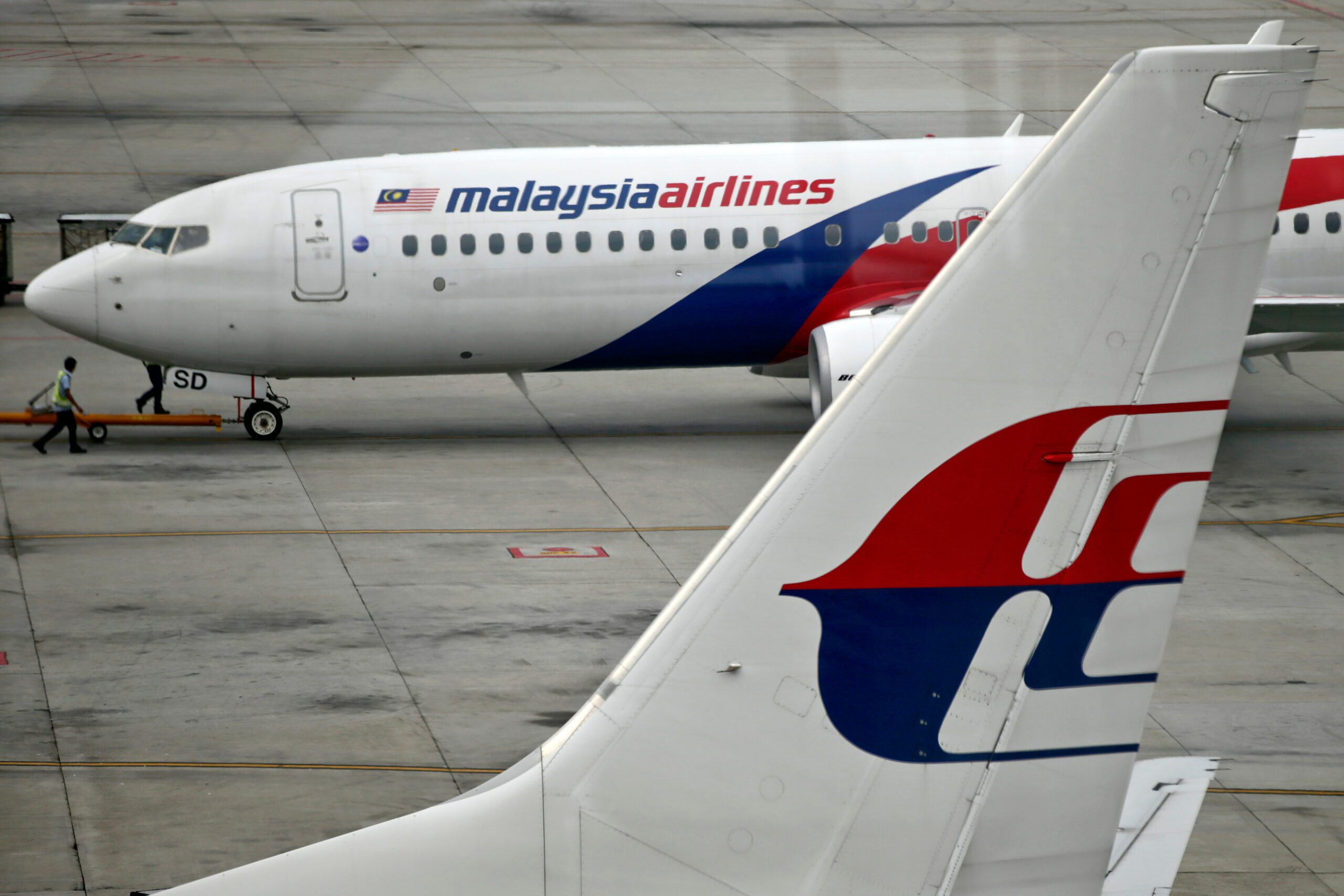 MH370 widow, sons sue Malaysia Airlines in Australia