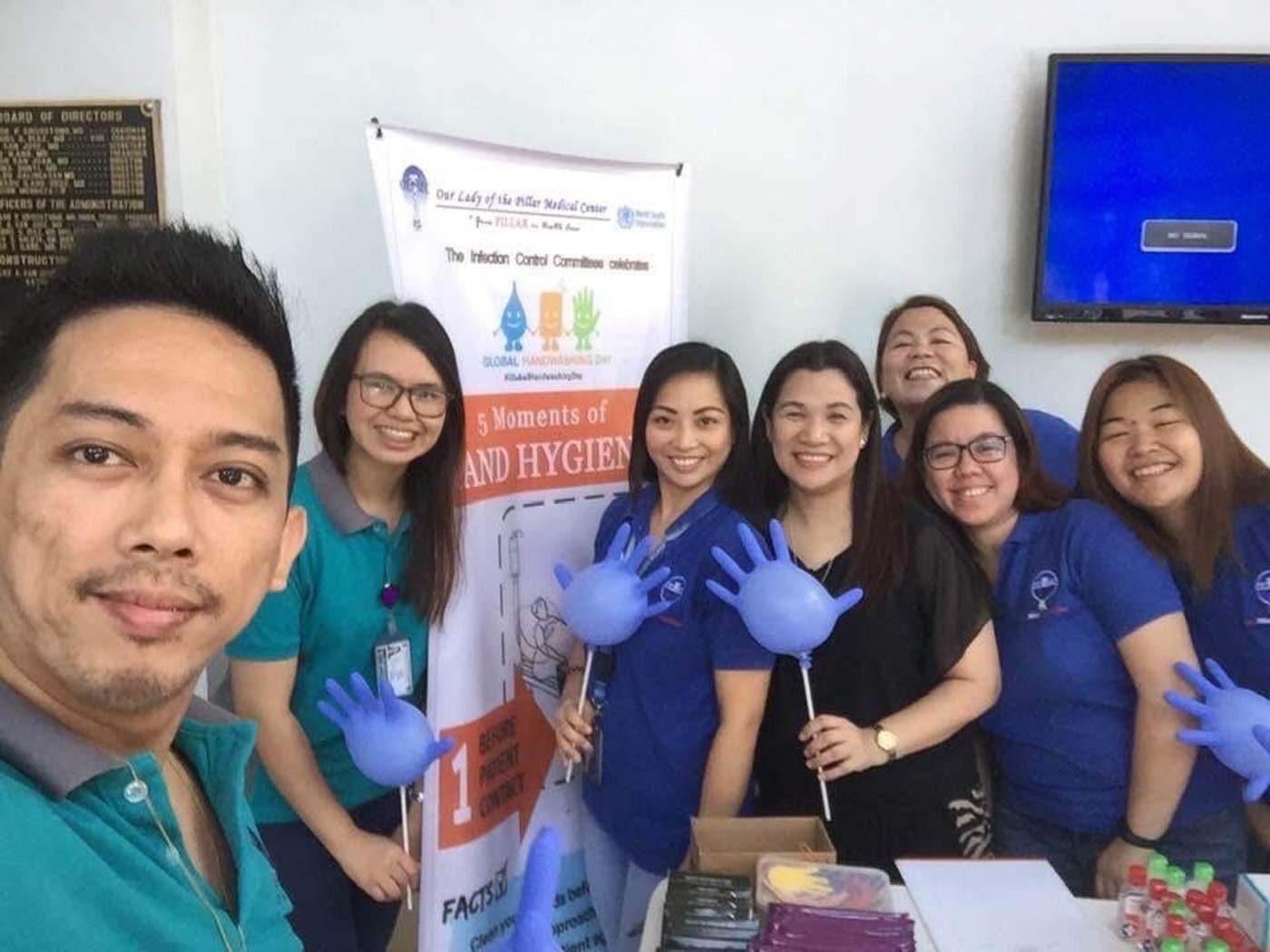 HEROES. Dr Cherry Abu (4th from left) smiles for the camera with other medical professionals in Cavite. Photo courtesy of Abu   