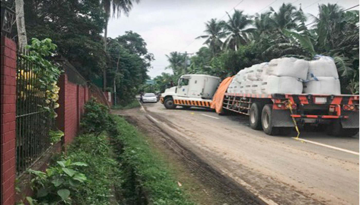 DISRUPTION. Residents of Barangay Calamias in Lipa City. complain that the heavy trucks that deliver material in and out of the facility cause further noise pollution and unwanted disruptions at night. Contributed photo 