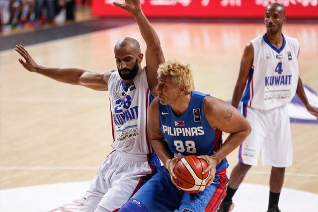 BIG MAN. Asi Taulava battles in the paint against Kuwait. Photo from FIBA 