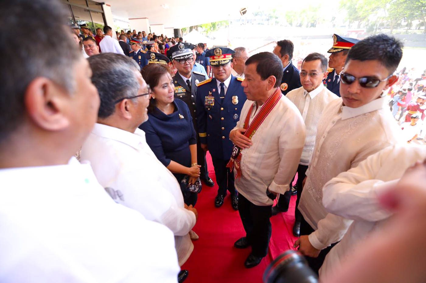 After ouster plot claim, Duterte and Robredo share PNPA stage