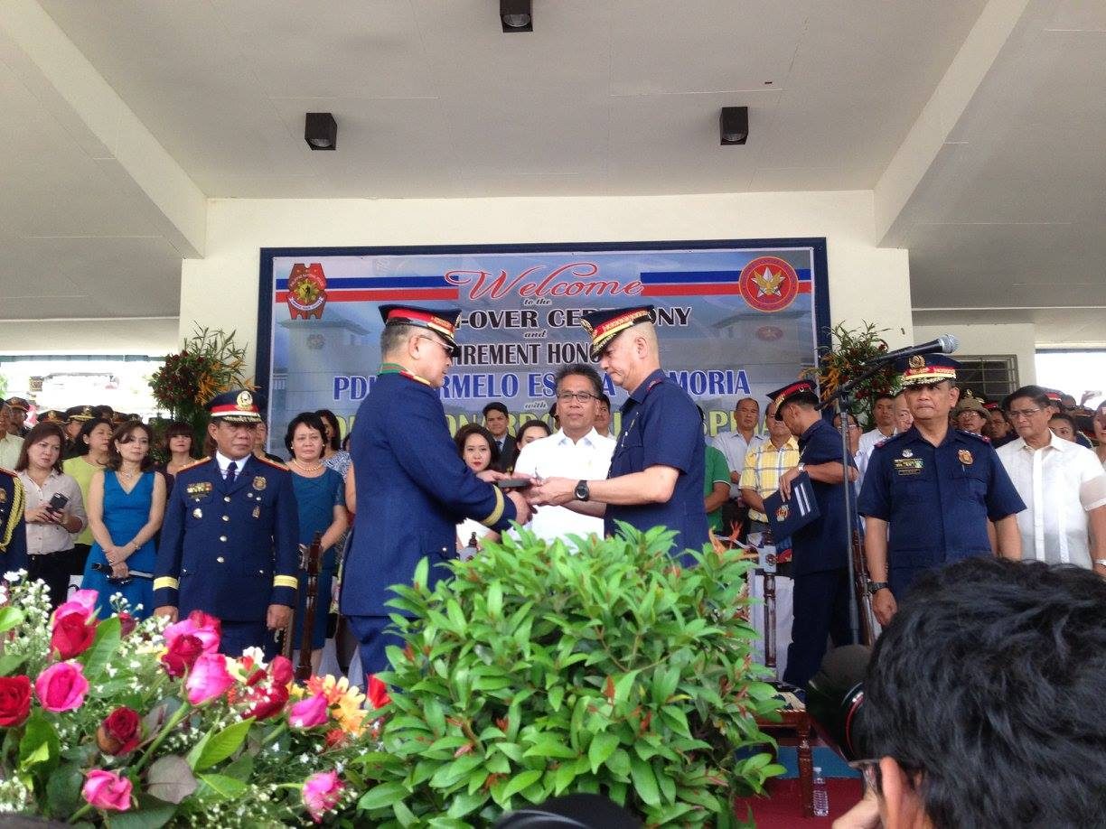 RETIRED CHIEF. Retired Director Carmelo Valmoria during his retirement ceremonies in Camp Bagong Diwa. Standing behind him is NCRPO OIC Chief Superintendent Allen Bantolo. Photo courtesy of the QCPD  