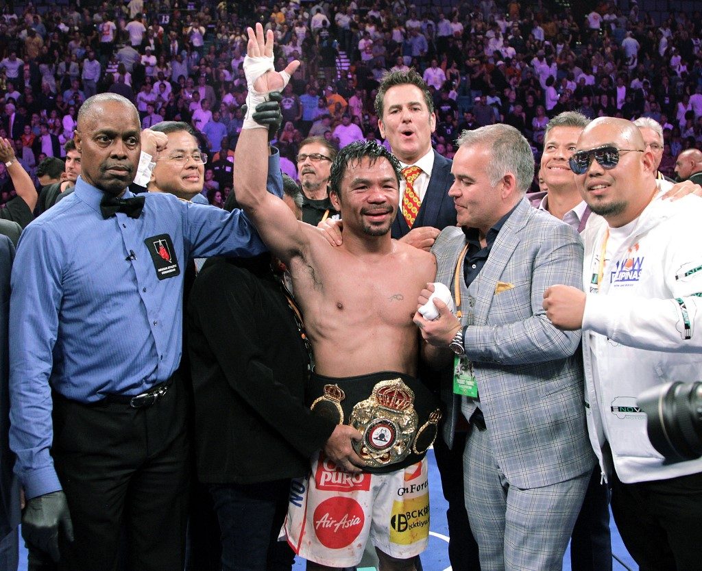 Pacquiao mulls future after title stunner