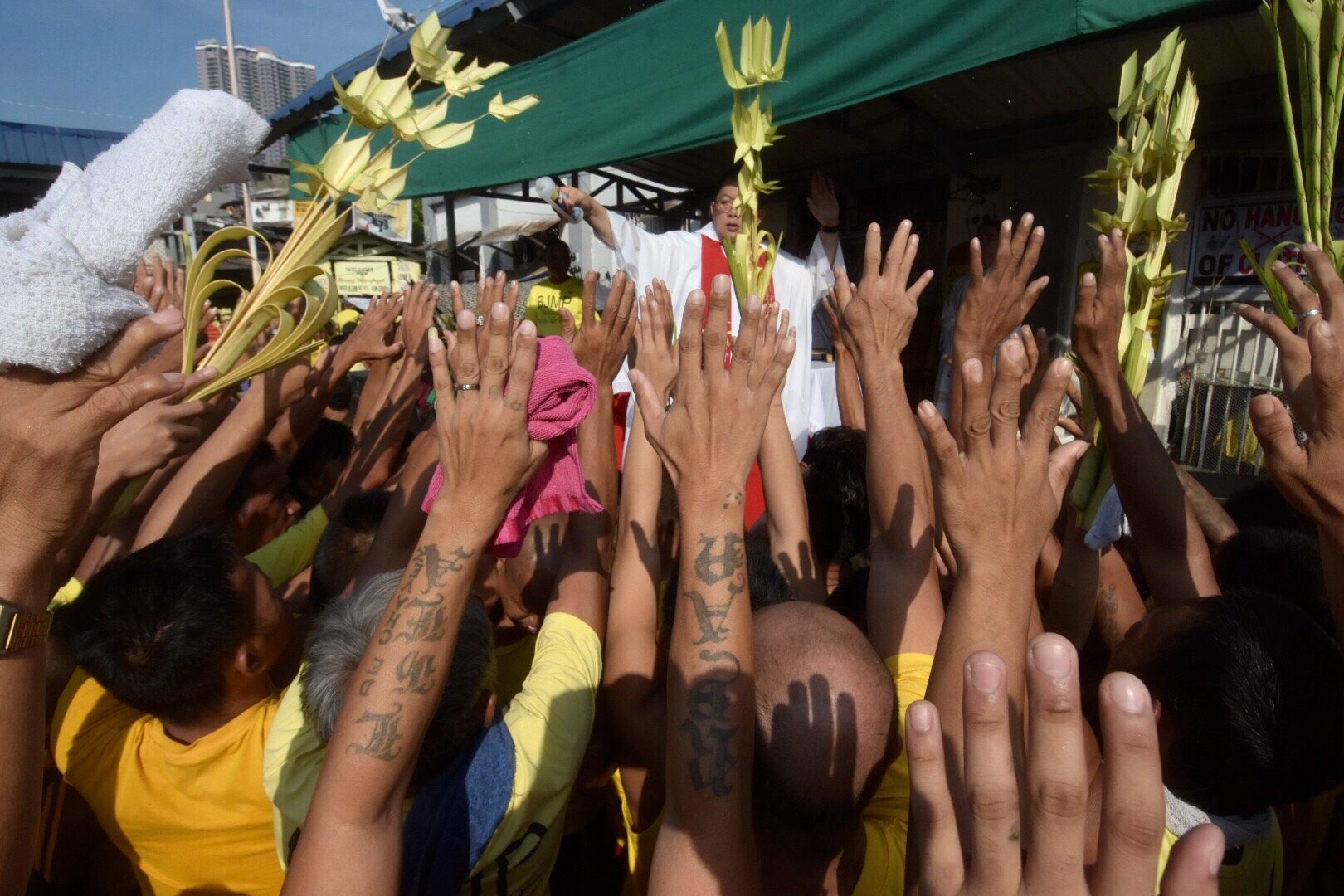 IN PHOTOS: From churches to jails, Filipinos mark Palm Sunday 2019