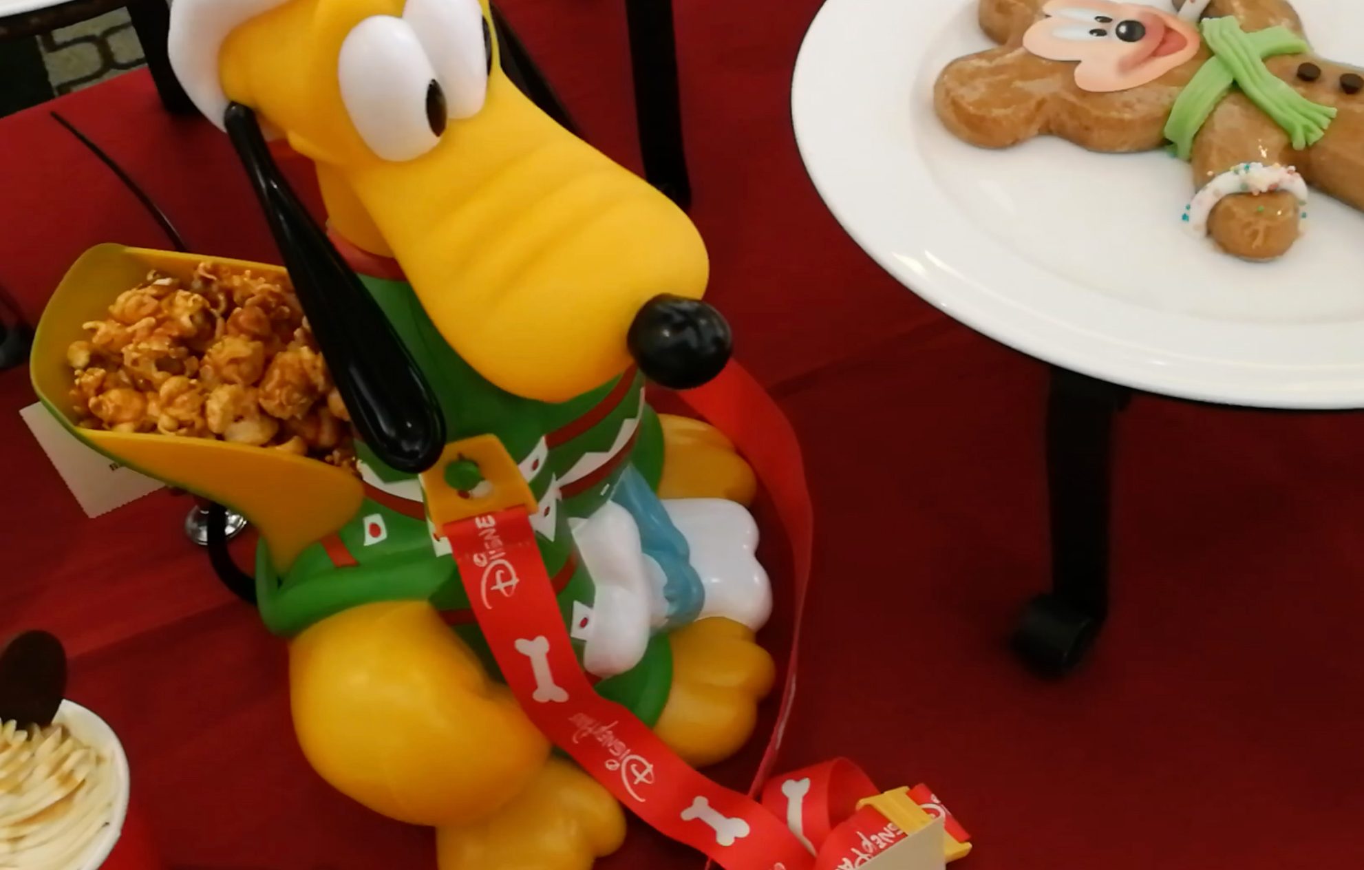 DISNEY FOOD. At Hong Kong Disneyland, Pluto holds your popcorn for you, while your gingerbread man comes in the shape of Mickey. Photo by Earnest Mangulabnan Zabala/Rappler  