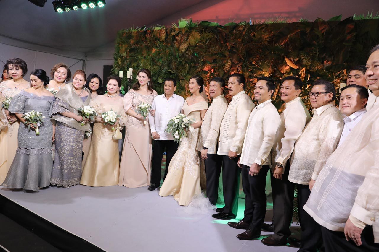 NINONGS, NINANGS. President Rodrigo Duterte and the other principal sponsors join the newlyweds. Malacañang photo 