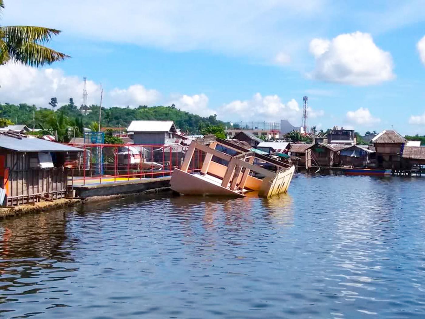 REMINDER. Local authorities won't remove the vessel that was stranded during Super Typhoon Yolanda, to remind residents of how the community survived and rebuilt. Photo by Jazmin Bonifacio/Rappler 