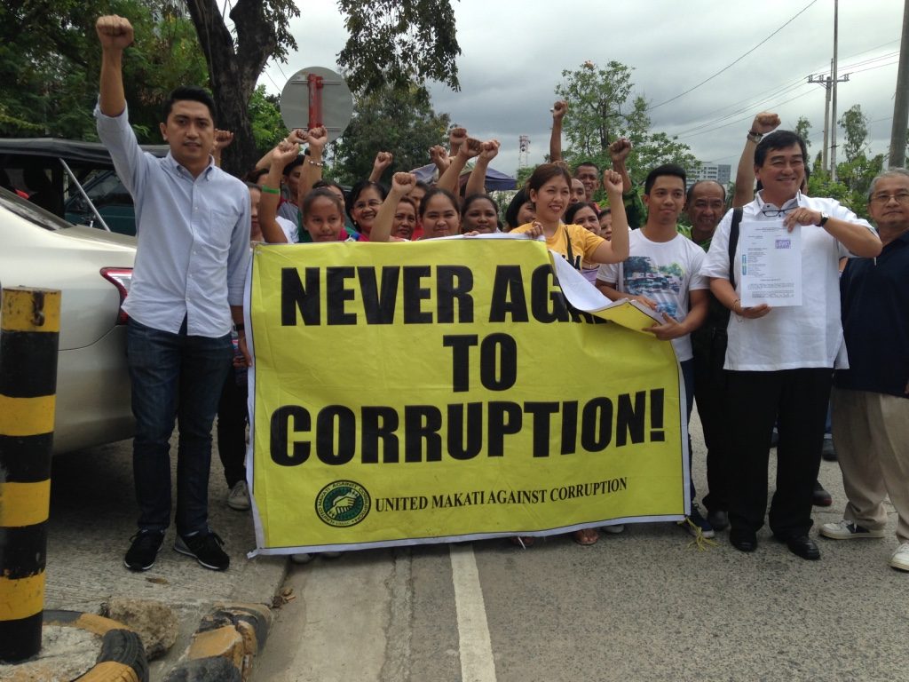 NEVER AGAIN. Bondal was accompanied by the United Makati Against Corruption group on December 18. Photo by Mara Cepeda/Rappler 