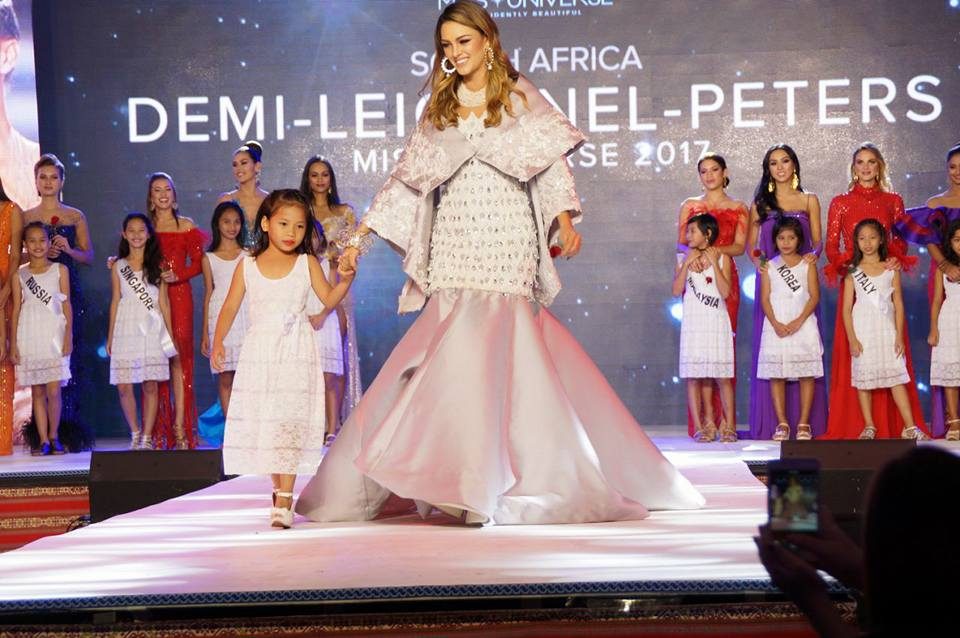 Demi-Leigh Nel-Peters with one of the kids from the Kanlungan sa Er-ma Foundation. This part of the program resembled the Little Sisters segment of the pageant in the '80s and '90s. Photo from the Department of Tourism   