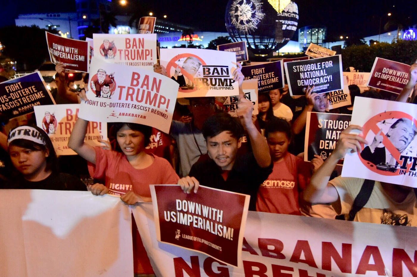 NOT WELCOME. These young people made sure to tell US president Donald Trump that he is not welcome in the Philippines. Photo by LeAnne Jazul/Rappler 