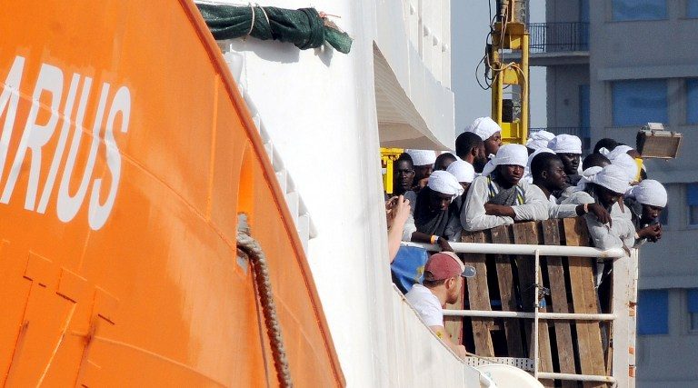 Italy urges EU ports to take migrants as pressure builds