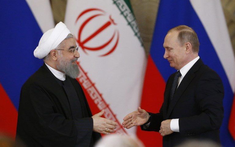 Russia, Iran ink economic deals as Rouhani visits Moscow
