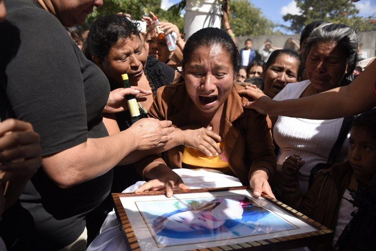 Guatemala begins burying 36 girls killed in shelter fire