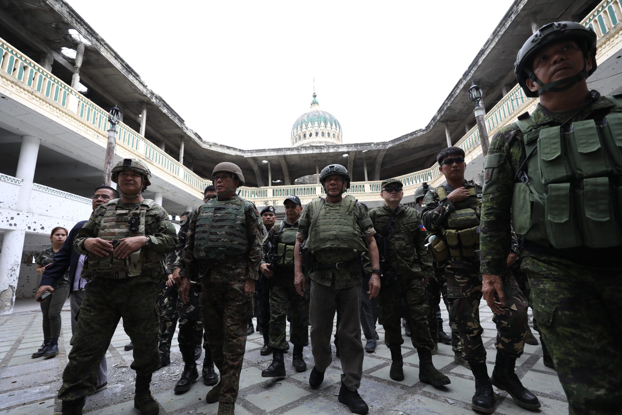 Duterte defends need to wear boots in Marawi mosque