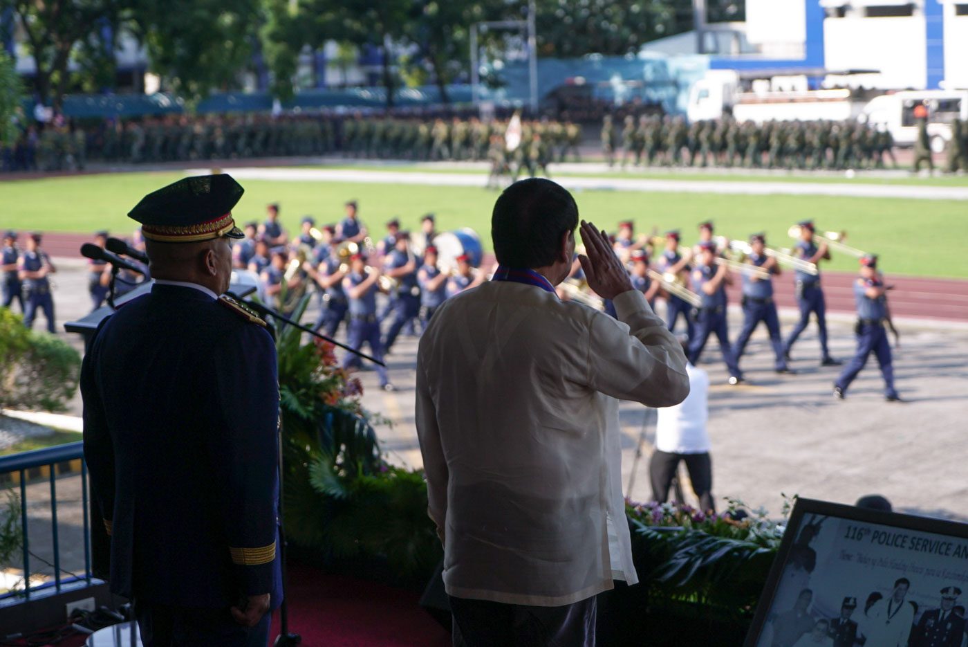 DUTERTE AND HIS POLICE. President Rodrigo Duterte salutes personnel of the Philippine National Police during the 116th Police Service Anniversary. Presidential photo  