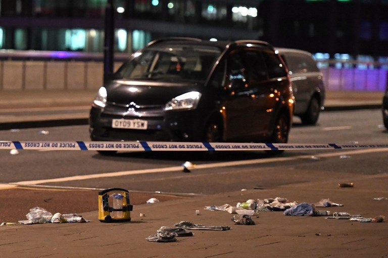 CRIME SCENE. Debris and abandoned cars remain on London at the scene of an apparent terror attack on London Bridge in central London on June 3, 2017. Chris J Ratcliffe/AFP 